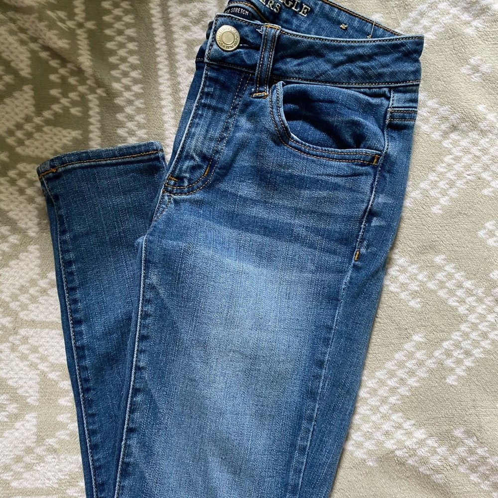 Medium wash blue AE jeans
